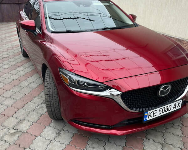 Красный Мазда 6, объемом двигателя 2.49 л и пробегом 73 тыс. км за 19500 $, фото 1 на Automoto.ua