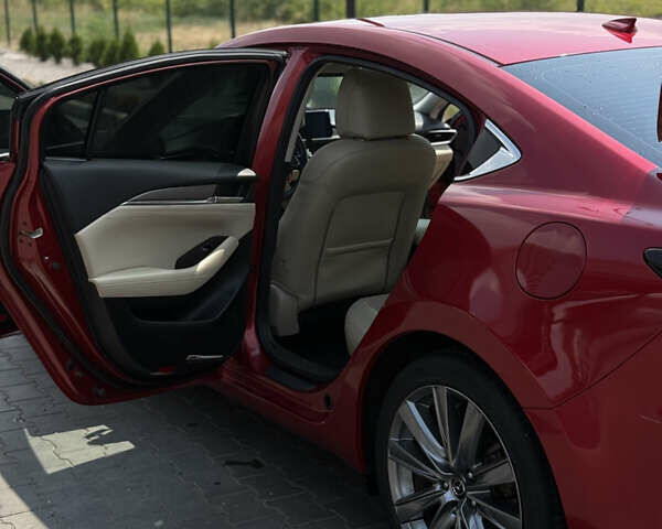 Красный Мазда 6, объемом двигателя 2.49 л и пробегом 74 тыс. км за 19000 $, фото 2 на Automoto.ua