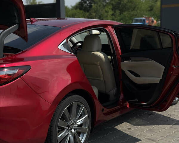 Красный Мазда 6, объемом двигателя 2.49 л и пробегом 74 тыс. км за 19000 $, фото 7 на Automoto.ua