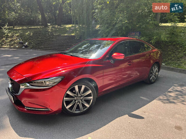 Красный Мазда 6, объемом двигателя 2 л и пробегом 41 тыс. км за 22900 $, фото 1 на Automoto.ua