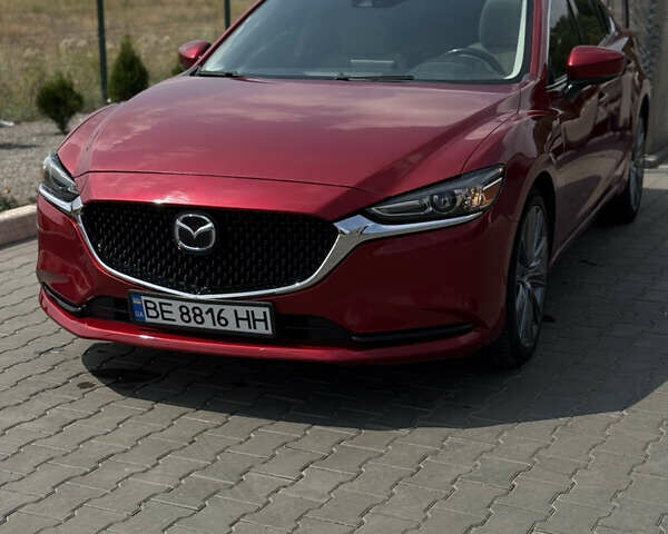 Красный Мазда 6, объемом двигателя 2.49 л и пробегом 74 тыс. км за 19000 $, фото 1 на Automoto.ua