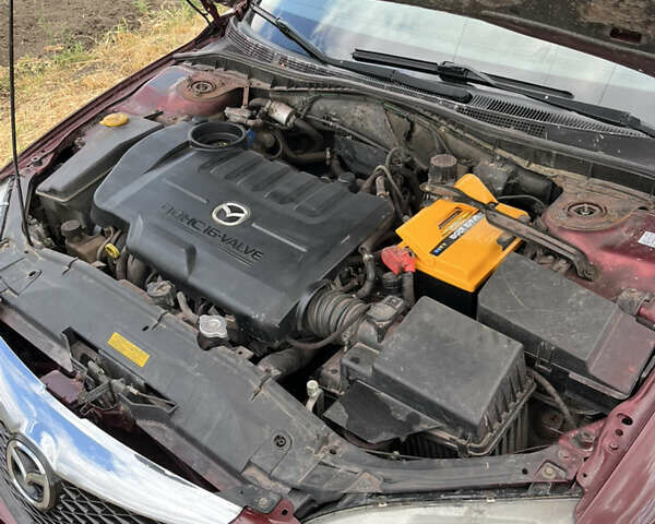 Красный Мазда 6, объемом двигателя 1.8 л и пробегом 328 тыс. км за 3900 $, фото 19 на Automoto.ua