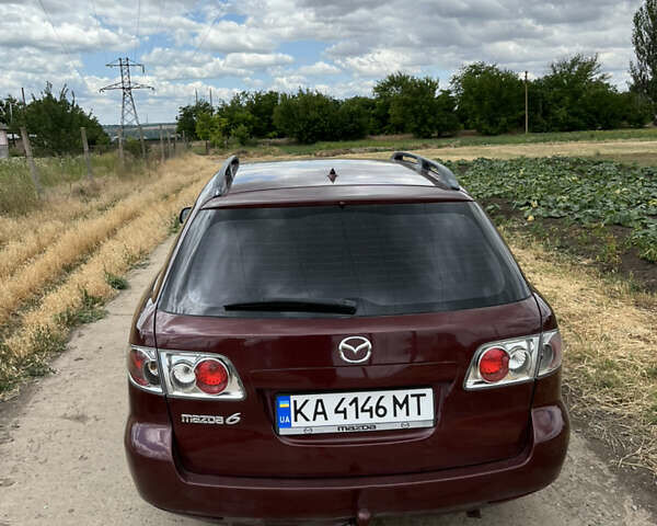 Красный Мазда 6, объемом двигателя 1.8 л и пробегом 328 тыс. км за 3900 $, фото 5 на Automoto.ua