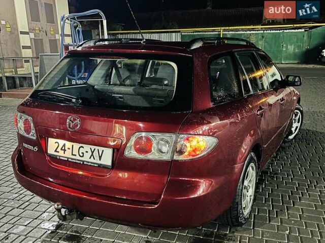 Красный Мазда 6, объемом двигателя 2 л и пробегом 300 тыс. км за 2100 $, фото 1 на Automoto.ua