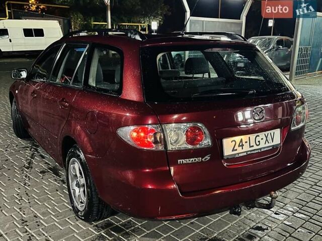 Красный Мазда 6, объемом двигателя 2 л и пробегом 300 тыс. км за 2100 $, фото 2 на Automoto.ua