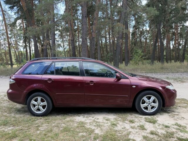 Красный Мазда 6, объемом двигателя 2 л и пробегом 245 тыс. км за 2951 $, фото 4 на Automoto.ua