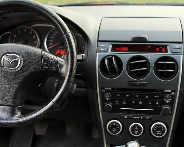 Красный Мазда 6, объемом двигателя 1.8 л и пробегом 302 тыс. км за 5550 $, фото 8 на Automoto.ua