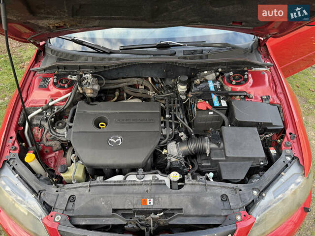 Красный Мазда 6, объемом двигателя 1.8 л и пробегом 302 тыс. км за 5550 $, фото 6 на Automoto.ua