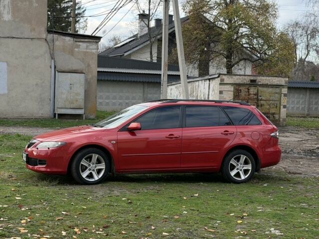 Червоний Мазда 6, об'ємом двигуна 1.8 л та пробігом 301 тис. км за 5250 $, фото 4 на Automoto.ua