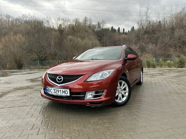 Красный Мазда 6, объемом двигателя 2.2 л и пробегом 245 тыс. км за 6700 $, фото 1 на Automoto.ua