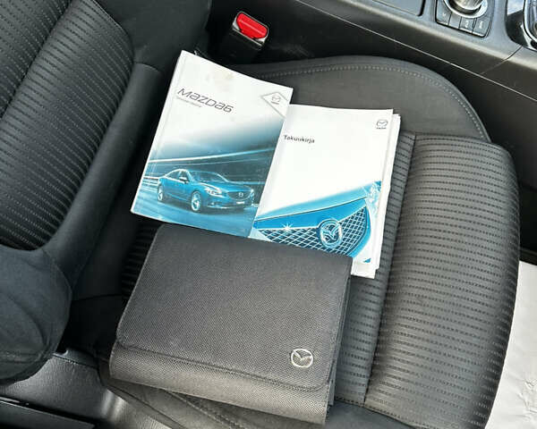 Червоний Мазда 6, об'ємом двигуна 2.18 л та пробігом 287 тис. км за 9777 $, фото 48 на Automoto.ua