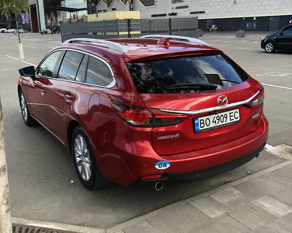 Красный Мазда 6, объемом двигателя 2.18 л и пробегом 249 тыс. км за 10400 $, фото 4 на Automoto.ua