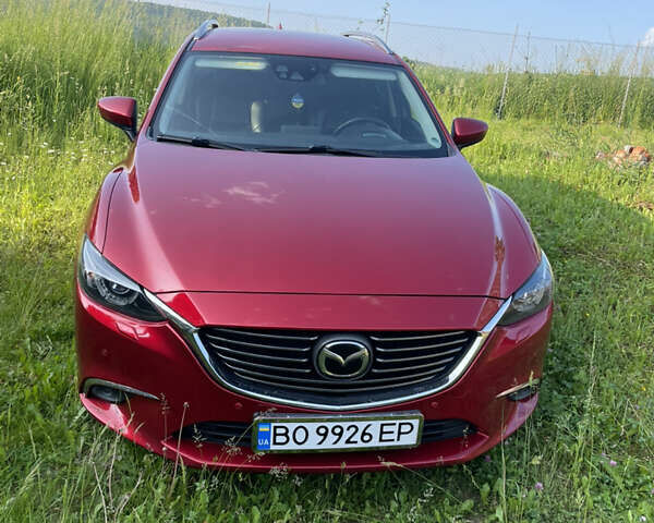 Красный Мазда 6, объемом двигателя 2.2 л и пробегом 245 тыс. км за 12500 $, фото 1 на Automoto.ua