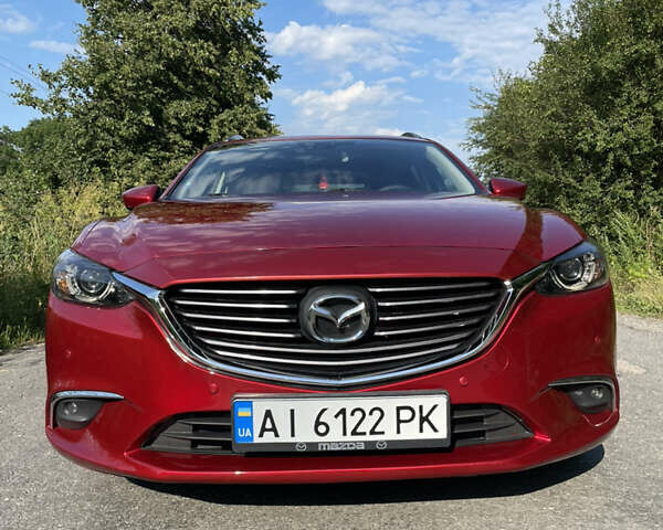 Красный Мазда 6, объемом двигателя 2.2 л и пробегом 200 тыс. км за 11900 $, фото 1 на Automoto.ua