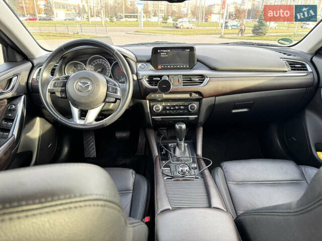 Червоний Мазда 6, об'ємом двигуна 2.2 л та пробігом 223 тис. км за 13050 $, фото 7 на Automoto.ua