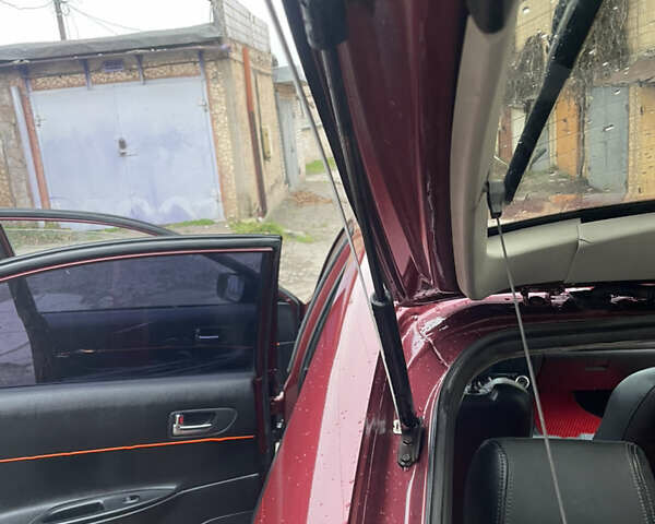 Красный Мазда 6, объемом двигателя 2 л и пробегом 220 тыс. км за 5000 $, фото 11 на Automoto.ua