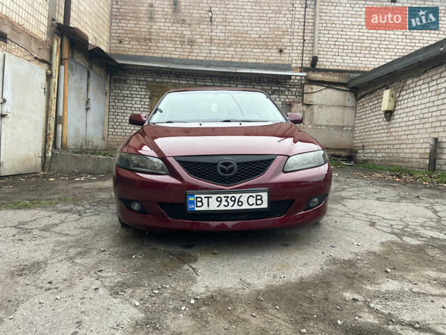 Красный Мазда 6, объемом двигателя 2 л и пробегом 220 тыс. км за 5000 $, фото 1 на Automoto.ua