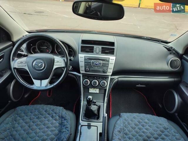 Красный Мазда 6, объемом двигателя 2.18 л и пробегом 231 тыс. км за 5650 $, фото 4 на Automoto.ua