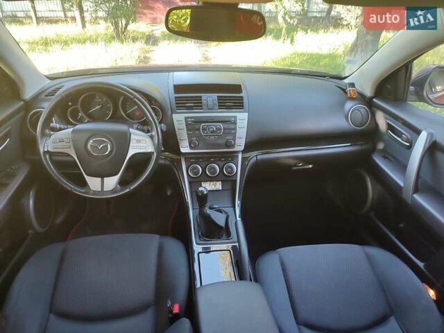 Красный Мазда 6, объемом двигателя 2.18 л и пробегом 231 тыс. км за 5650 $, фото 10 на Automoto.ua