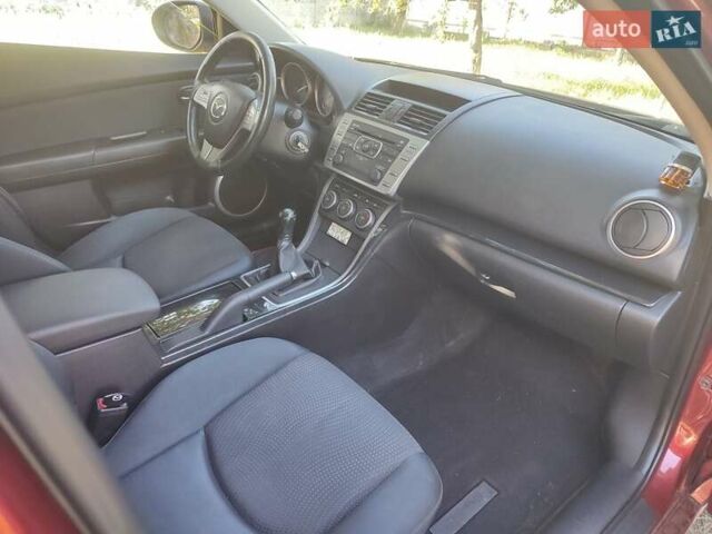 Красный Мазда 6, объемом двигателя 2.18 л и пробегом 231 тыс. км за 5650 $, фото 12 на Automoto.ua