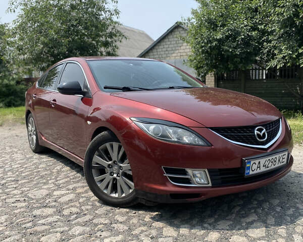 Красный Мазда 6, объемом двигателя 2.2 л и пробегом 376 тыс. км за 6500 $, фото 1 на Automoto.ua