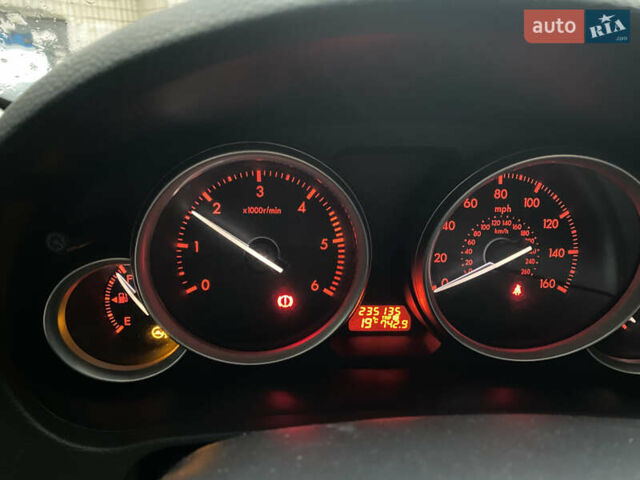 Красный Мазда 6, объемом двигателя 2.2 л и пробегом 376 тыс. км за 6500 $, фото 5 на Automoto.ua