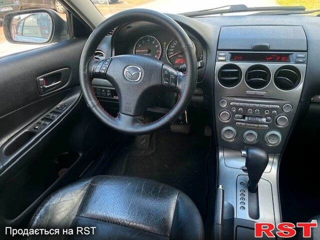 Мазда 6, объемом двигателя 2 л и пробегом 214 тыс. км за 2000 $, фото 4 на Automoto.ua