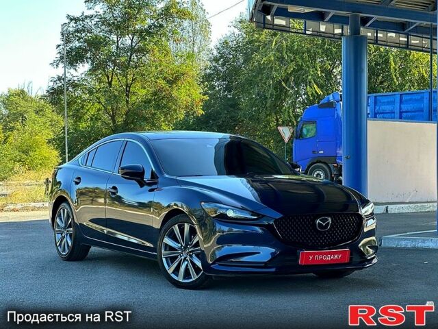 Мазда 6, объемом двигателя 25 л и пробегом 70 тыс. км за 17000 $, фото 5 на Automoto.ua