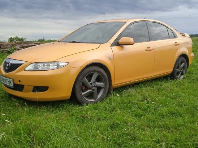 Желтый Мазда 6, объемом двигателя 2 л и пробегом 133 тыс. км за 3700 $, фото 1 на Automoto.ua