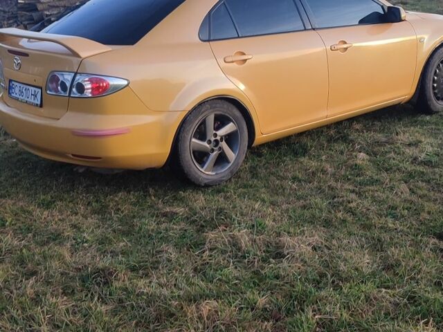 Жовтий Мазда 6, об'ємом двигуна 2 л та пробігом 303 тис. км за 3700 $, фото 3 на Automoto.ua