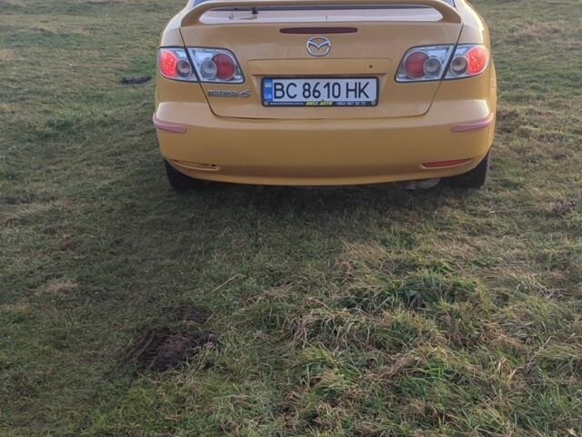 Жовтий Мазда 6, об'ємом двигуна 2 л та пробігом 303 тис. км за 3700 $, фото 4 на Automoto.ua