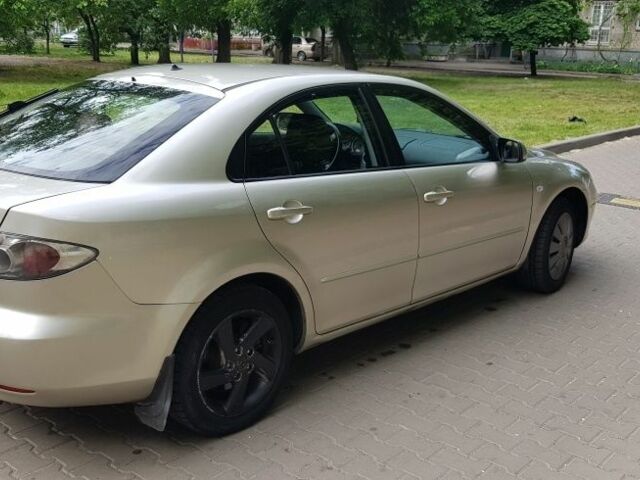 Жовтий Мазда 6, об'ємом двигуна 2 л та пробігом 300 тис. км за 3500 $, фото 7 на Automoto.ua