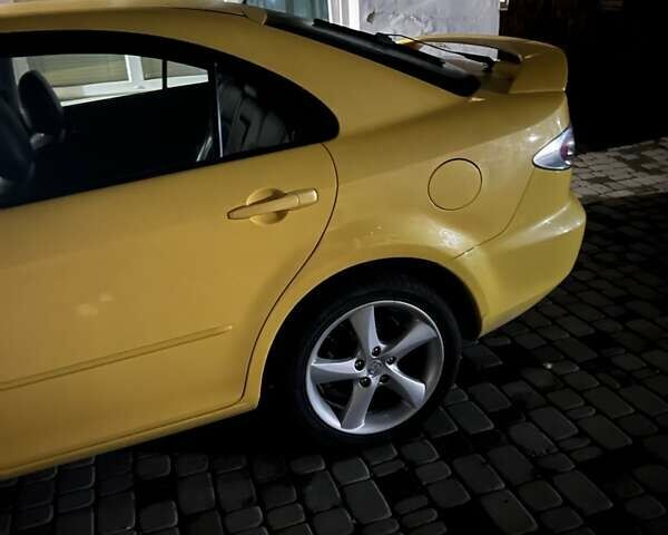 Желтый Мазда 6, объемом двигателя 2.3 л и пробегом 220 тыс. км за 4300 $, фото 2 на Automoto.ua