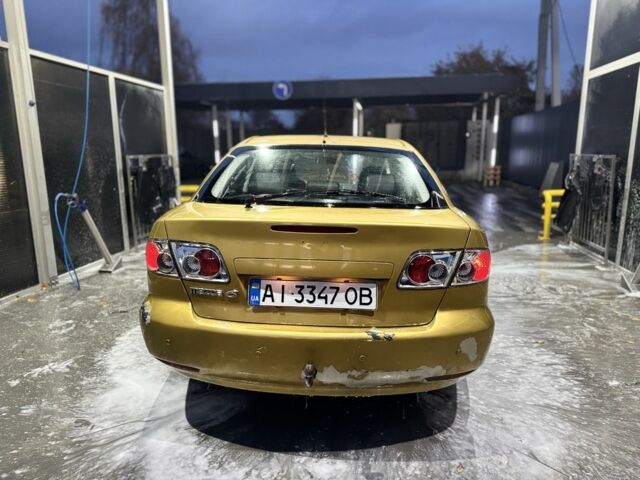 Желтый Мазда 6, объемом двигателя 2.3 л и пробегом 191 тыс. км за 2650 $, фото 4 на Automoto.ua