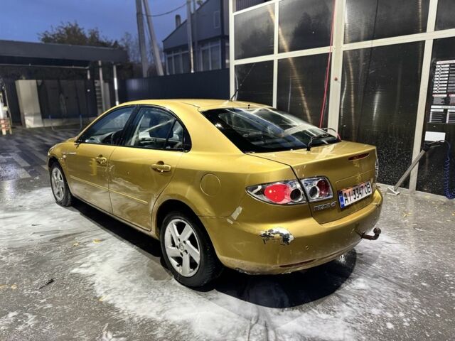 Желтый Мазда 6, объемом двигателя 2.3 л и пробегом 191 тыс. км за 2650 $, фото 2 на Automoto.ua