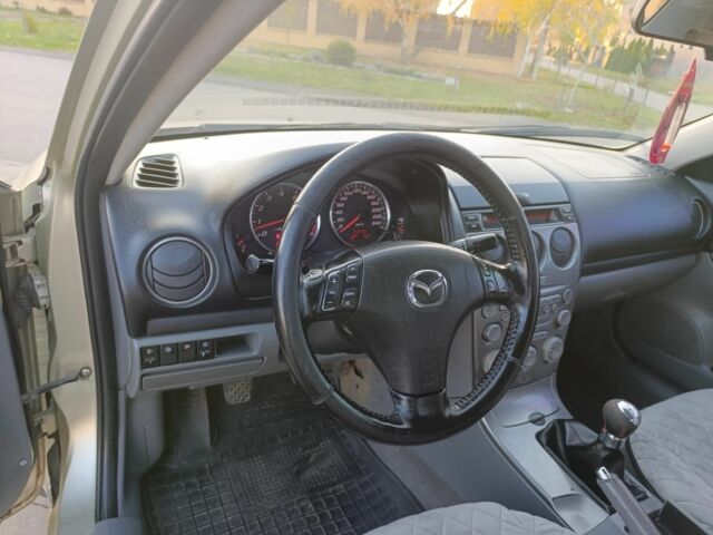 Жовтий Мазда 6, об'ємом двигуна 2 л та пробігом 330 тис. км за 3399 $, фото 18 на Automoto.ua