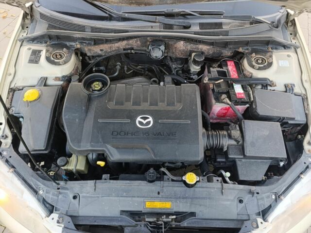 Жовтий Мазда 6, об'ємом двигуна 2 л та пробігом 330 тис. км за 3399 $, фото 22 на Automoto.ua