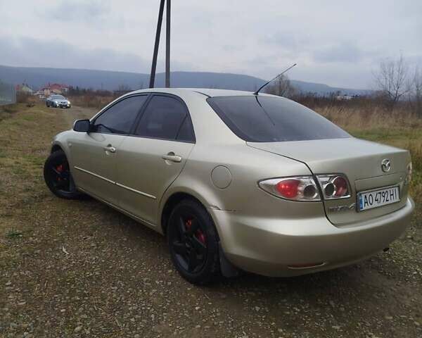 Желтый Мазда 6, объемом двигателя 2 л и пробегом 340 тыс. км за 3600 $, фото 7 на Automoto.ua