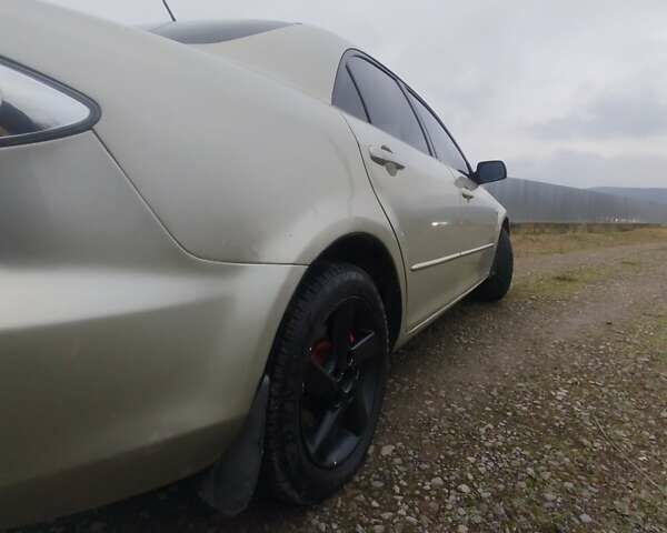 Желтый Мазда 6, объемом двигателя 2 л и пробегом 340 тыс. км за 3600 $, фото 4 на Automoto.ua