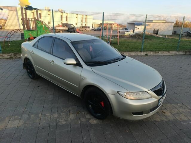 Жовтий Мазда 6, об'ємом двигуна 2 л та пробігом 330 тис. км за 3399 $, фото 2 на Automoto.ua