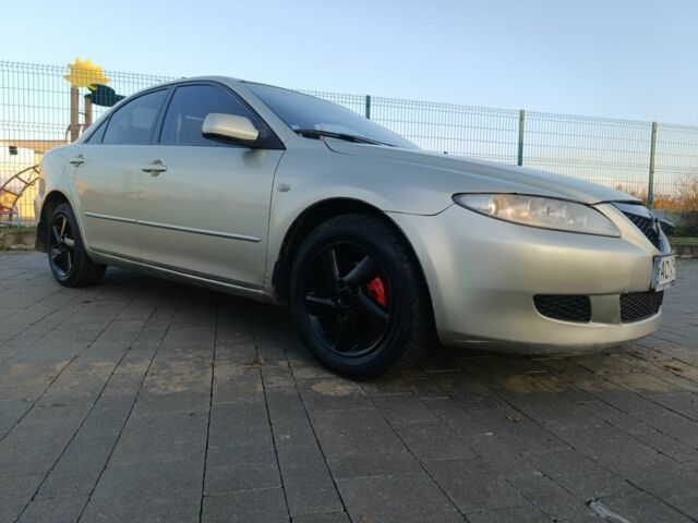 Жовтий Мазда 6, об'ємом двигуна 2 л та пробігом 330 тис. км за 3399 $, фото 4 на Automoto.ua