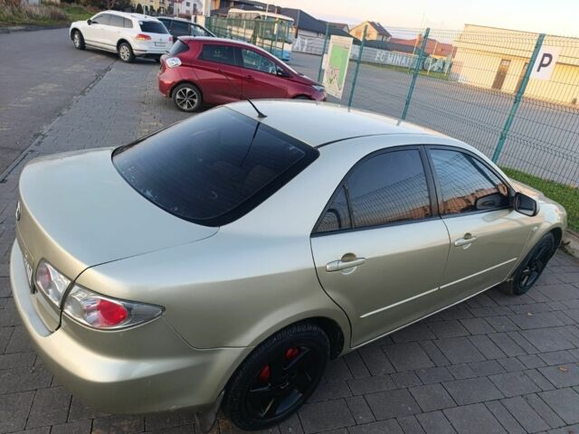 Жовтий Мазда 6, об'ємом двигуна 2 л та пробігом 330 тис. км за 3399 $, фото 7 на Automoto.ua