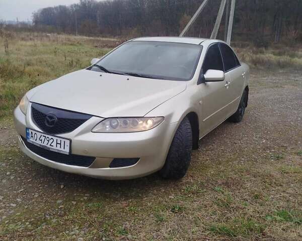 Желтый Мазда 6, объемом двигателя 2 л и пробегом 340 тыс. км за 3600 $, фото 2 на Automoto.ua