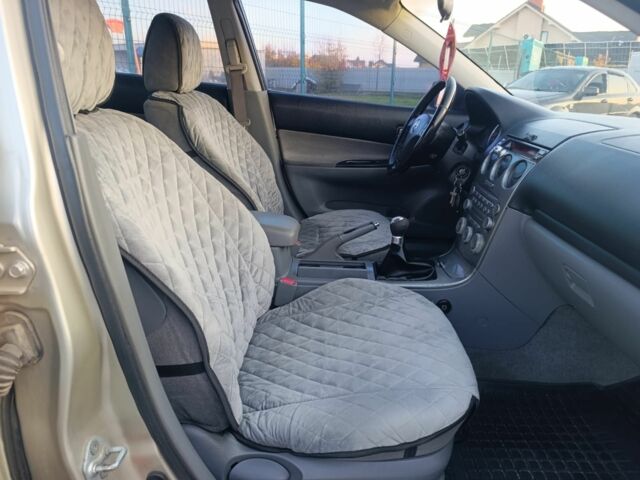 Жовтий Мазда 6, об'ємом двигуна 2 л та пробігом 330 тис. км за 3399 $, фото 10 на Automoto.ua