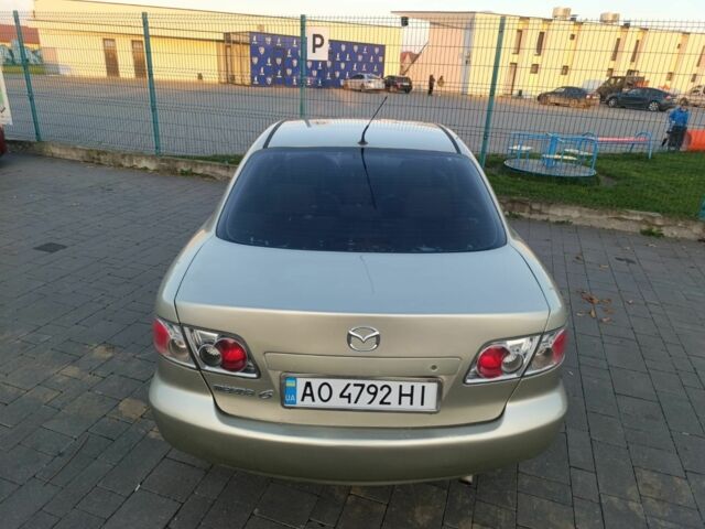 Жовтий Мазда 6, об'ємом двигуна 2 л та пробігом 330 тис. км за 3399 $, фото 5 на Automoto.ua