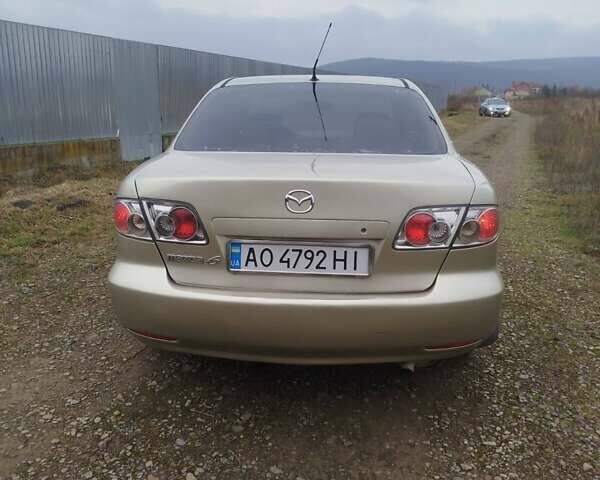 Желтый Мазда 6, объемом двигателя 2 л и пробегом 340 тыс. км за 3600 $, фото 8 на Automoto.ua