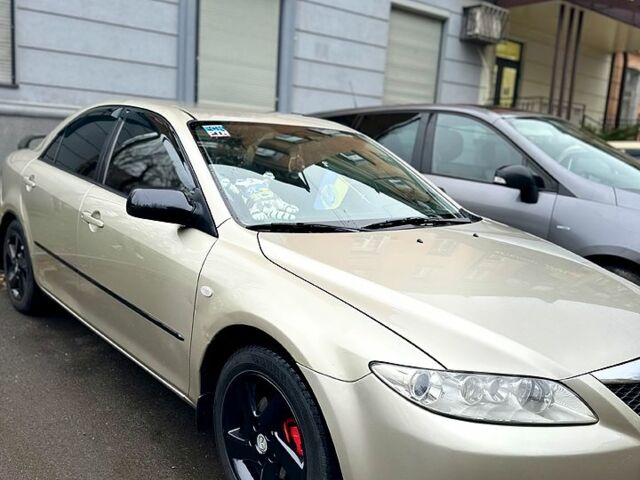 Желтый Мазда 6, объемом двигателя 2.3 л и пробегом 200 тыс. км за 4700 $, фото 1 на Automoto.ua
