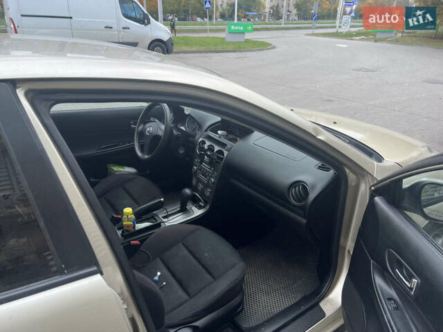 Желтый Мазда 6, объемом двигателя 1.99 л и пробегом 284 тыс. км за 4400 $, фото 6 на Automoto.ua