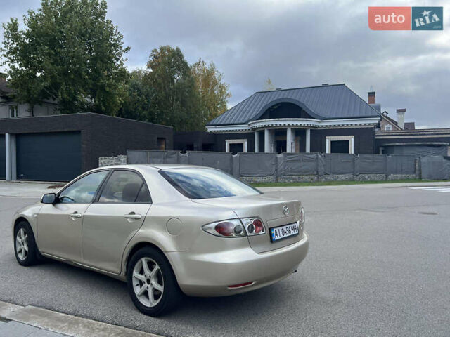 Желтый Мазда 6, объемом двигателя 1.99 л и пробегом 284 тыс. км за 4400 $, фото 9 на Automoto.ua