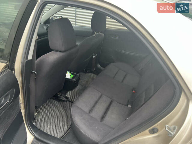 Желтый Мазда 6, объемом двигателя 1.99 л и пробегом 284 тыс. км за 4400 $, фото 8 на Automoto.ua